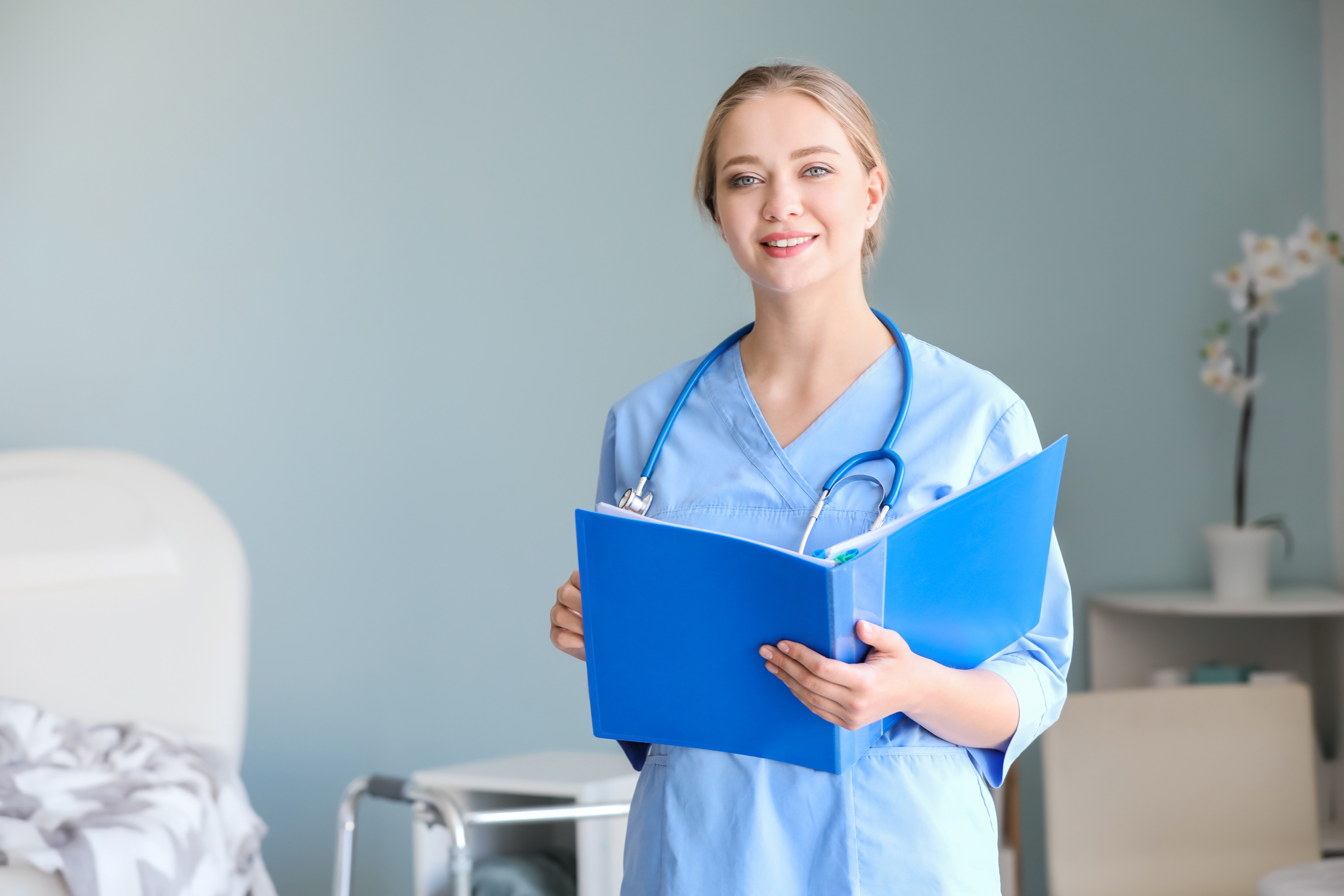 Medical Assistant with Documents in Clinic