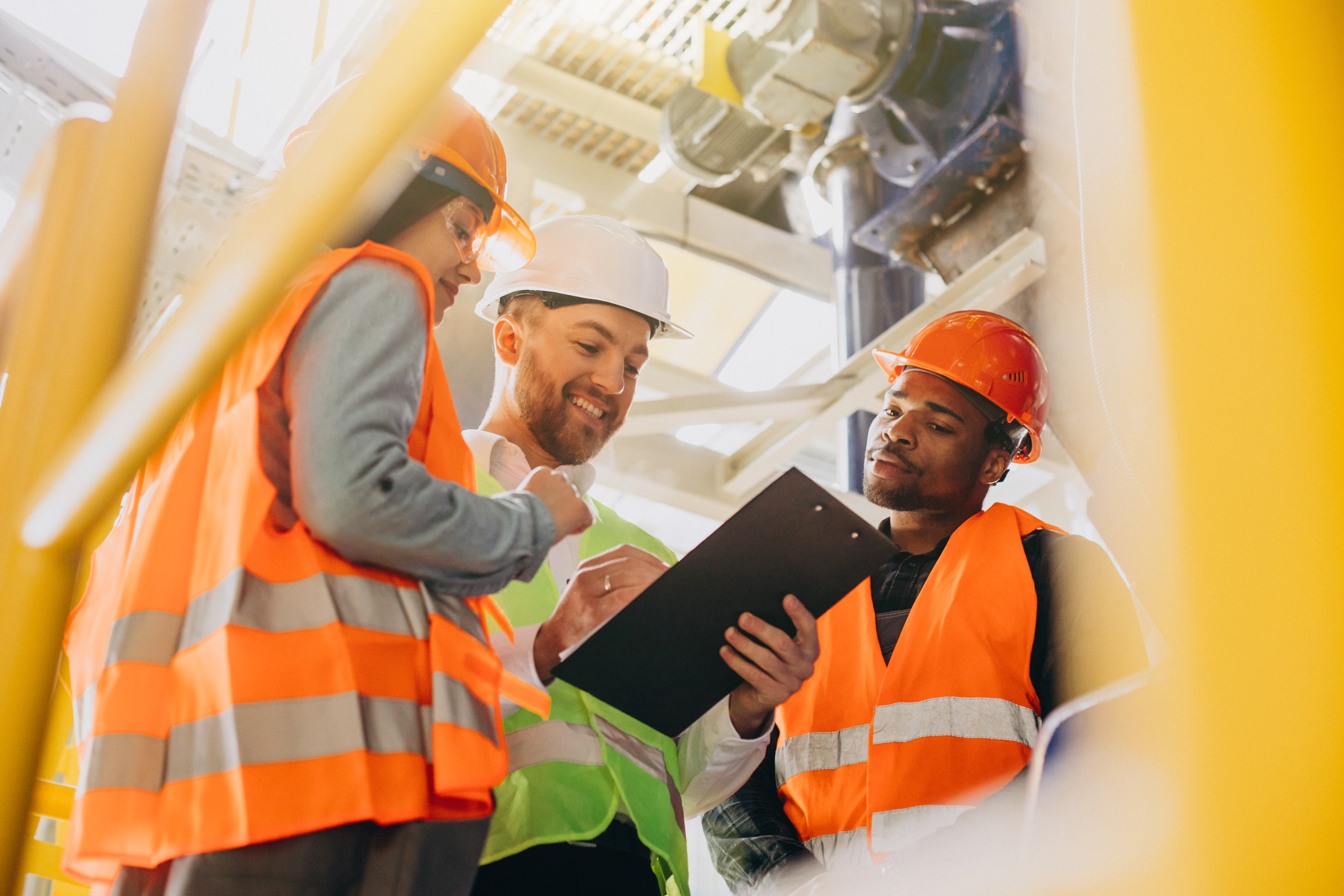 Taken from https://www.freepik.com/free-photo/three-people-discussing-plan-factory_24235052.htm