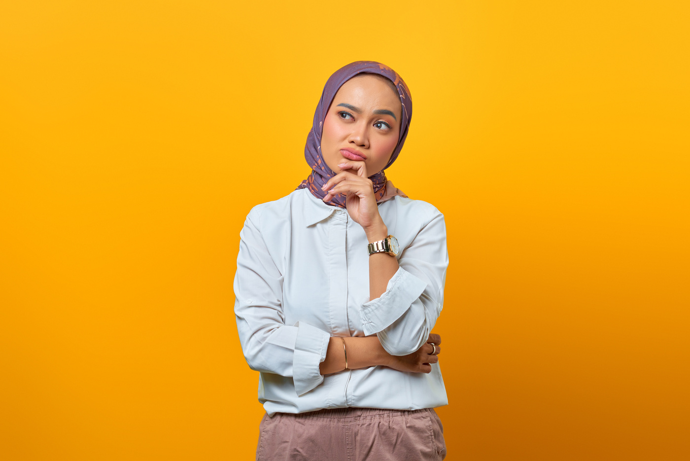 Beautiful Asian Woman Thinking with Hand on Chin Interested Look